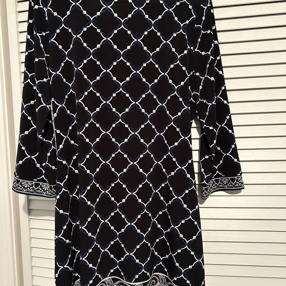New beautiful dress with price tag. Wear different pumps, flats, boots sandals.
